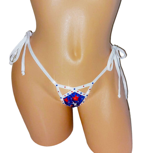 Red, white and Blue flag type bikini bottom with bedazzled rhinestone star design and white tie side straps on a mannequin against a white background