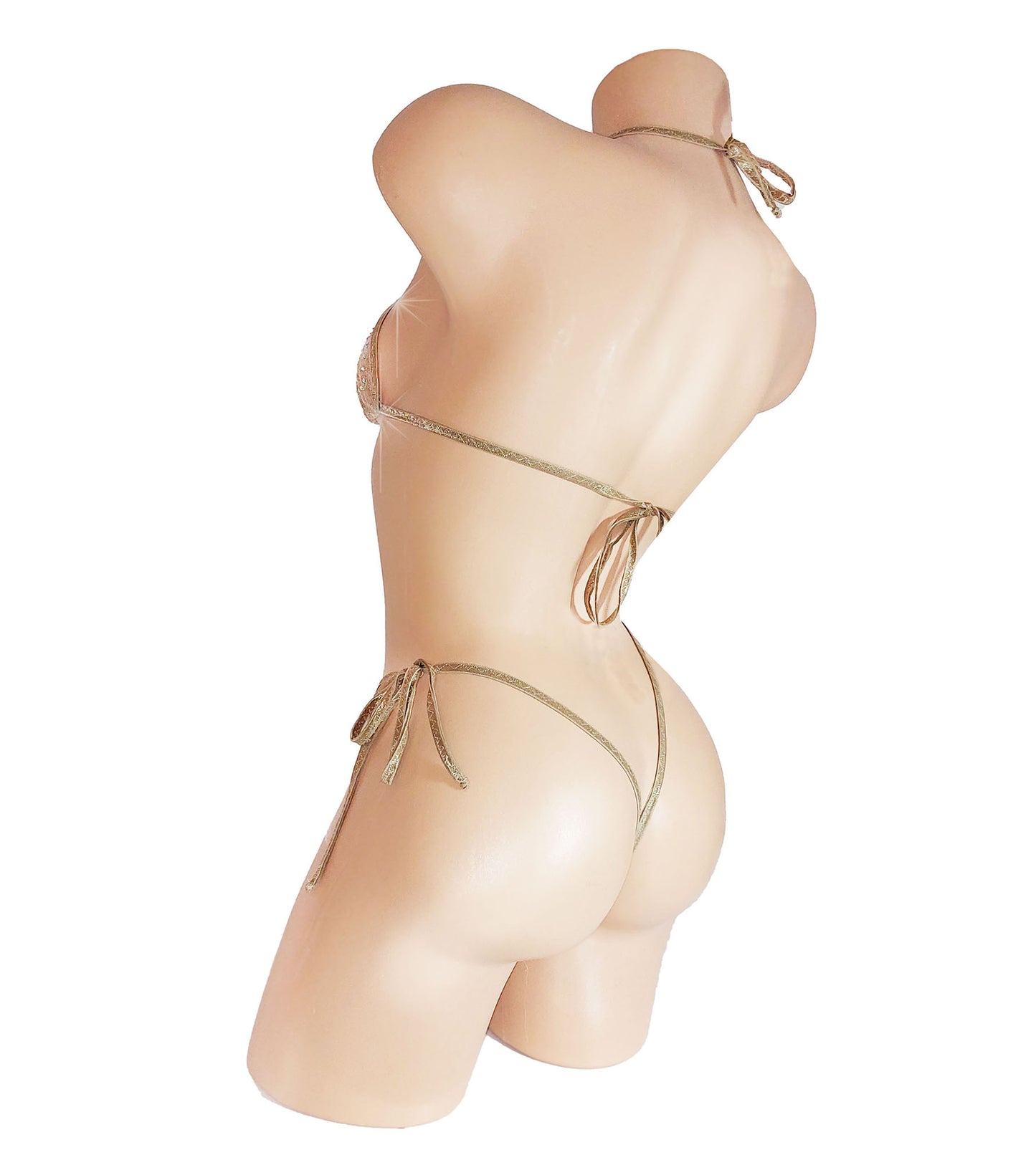 Rear view of Nude fabric bikini covered in rhinestones on a sexy mannequin.