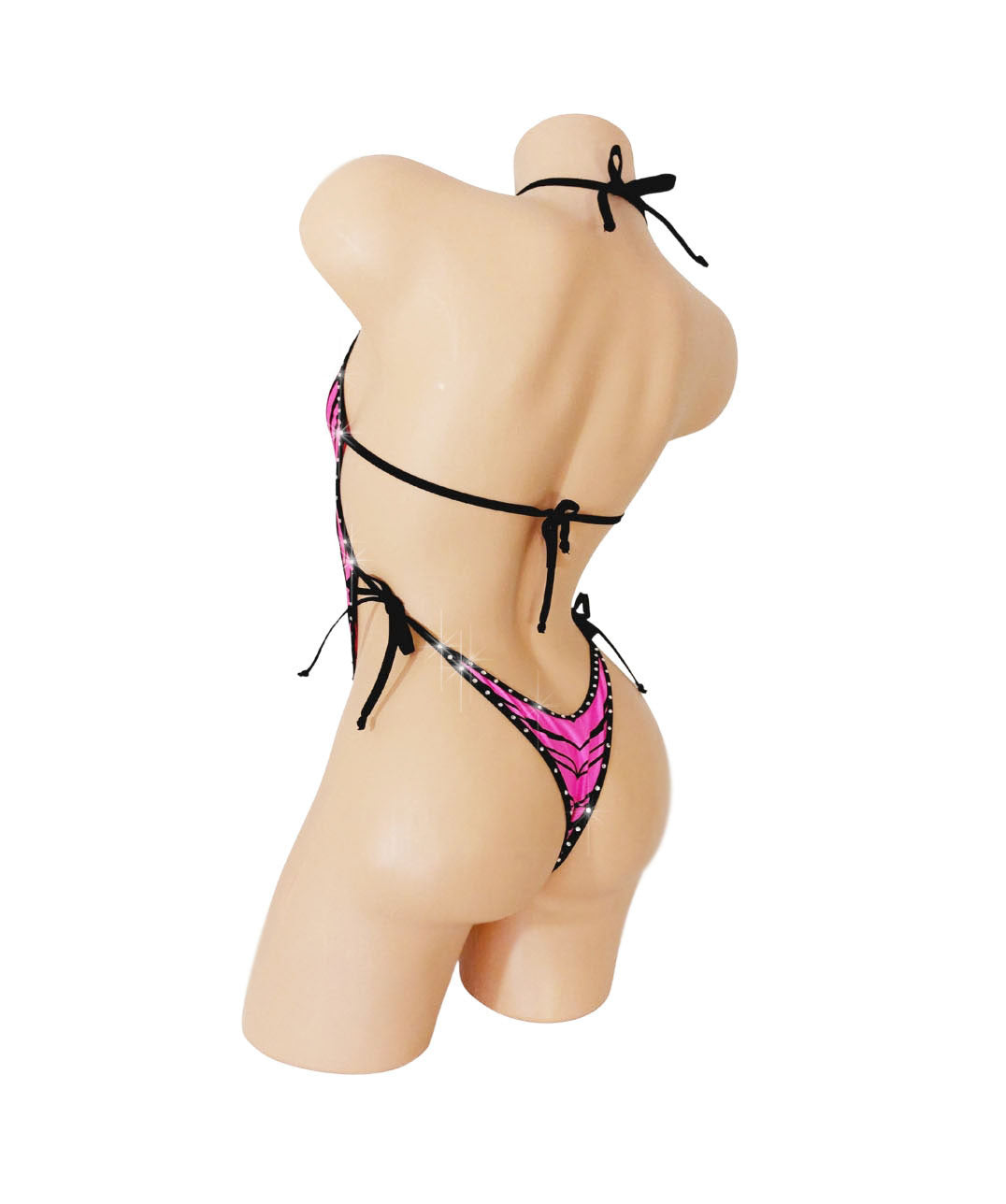One piece bathing suit with cutouts in Pink Zebra fabric with rhinestone trim, rear view.