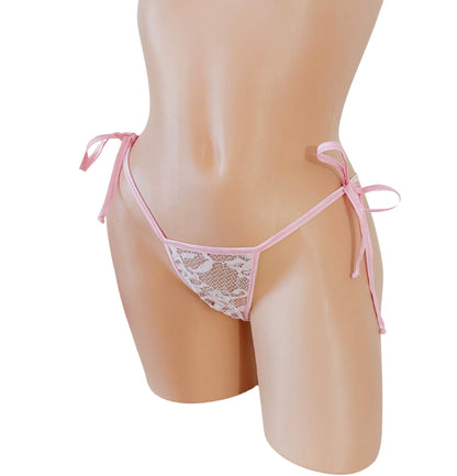 Baby Pink lace thong with side ties on a curvy mannequin.