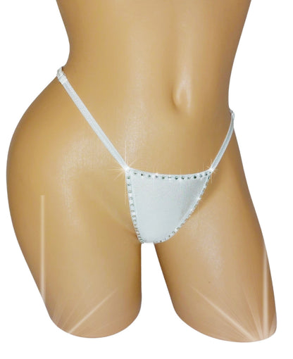 Photo of a white rhinestone thong on a curvy mannequin torso on a white background.