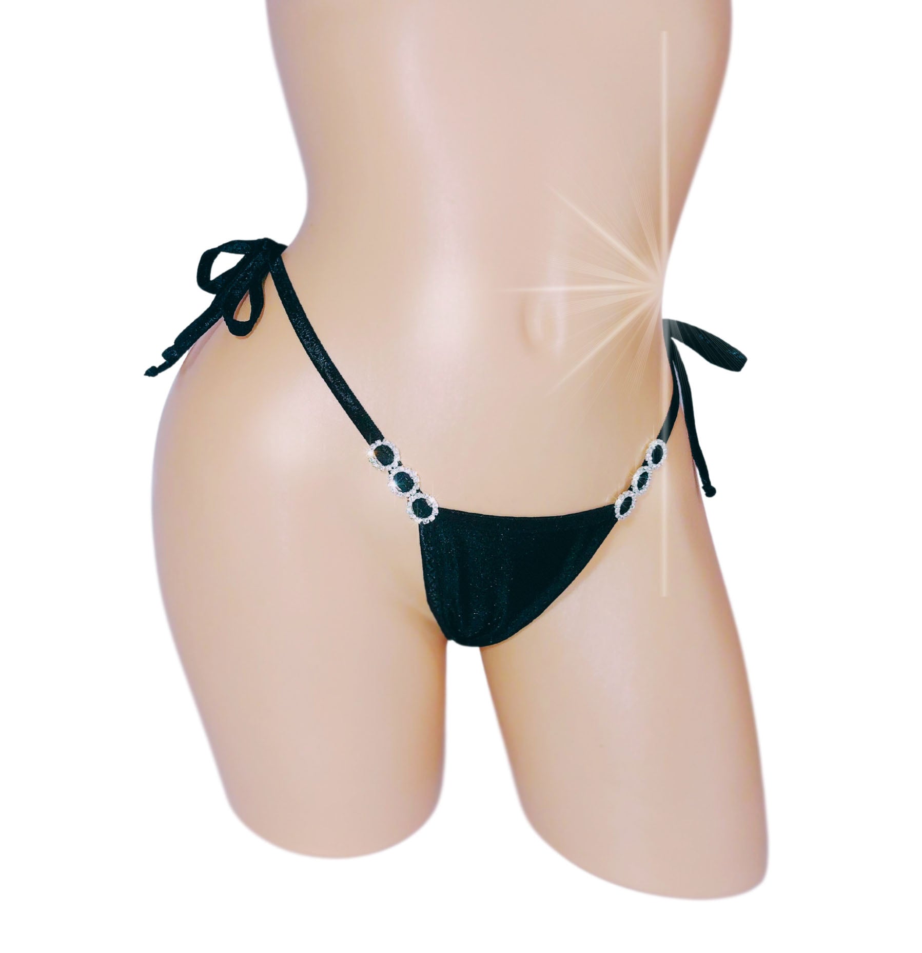 Black diamond accented tie side thong on a curvy mannequin torso.