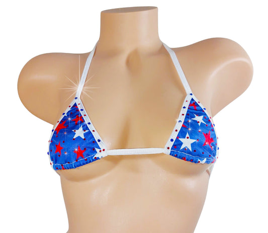 Rhinestone bedazzled Blue bikini top with red and white stars on a mannequin against a white background