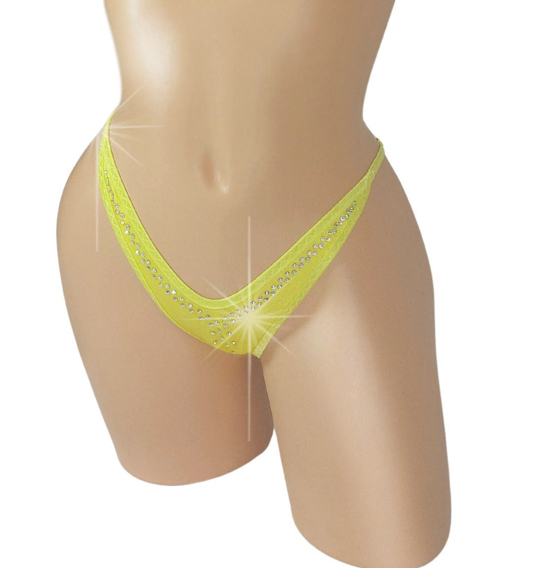 Yellow thong with rhinestones on a sexy mannequin form.