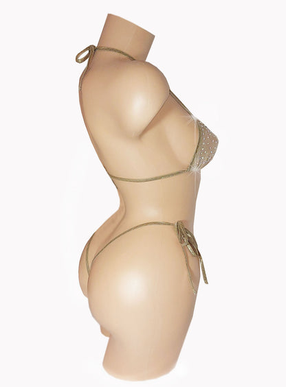 Side view of Nude fabric bikini covered in rhinestones on a sexy mannequin.