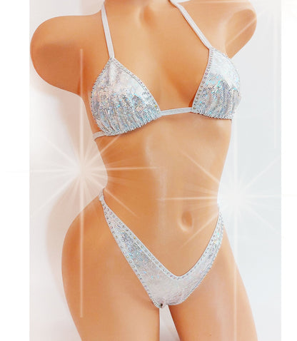 White hologram bikini with sparkly rhinestones on a curvy mannequin.