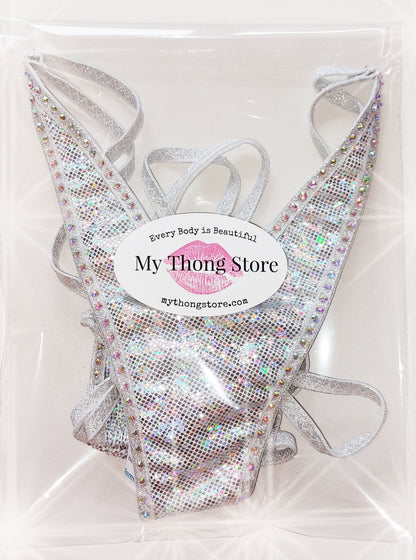 Package shot of White hologram bikini with sparkly rhinestones in mythongstore.com bag.