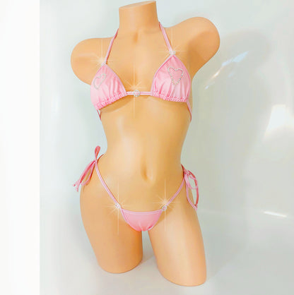 Rhinestone heart baby pink bikini set on a sexy mannequin.