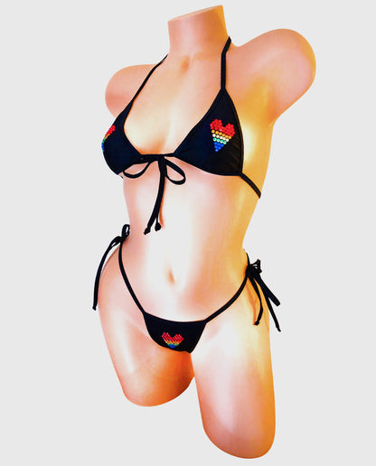 Rhinestone heart pride bikini on a sexy mannequin.