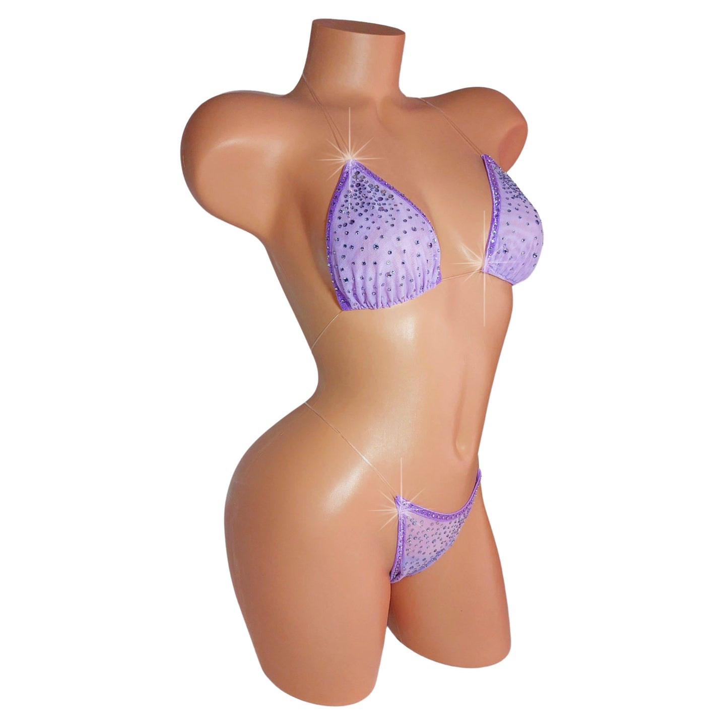 Semi-sheer Lilac bikini covered in rhinestones on a sexy mannequin.