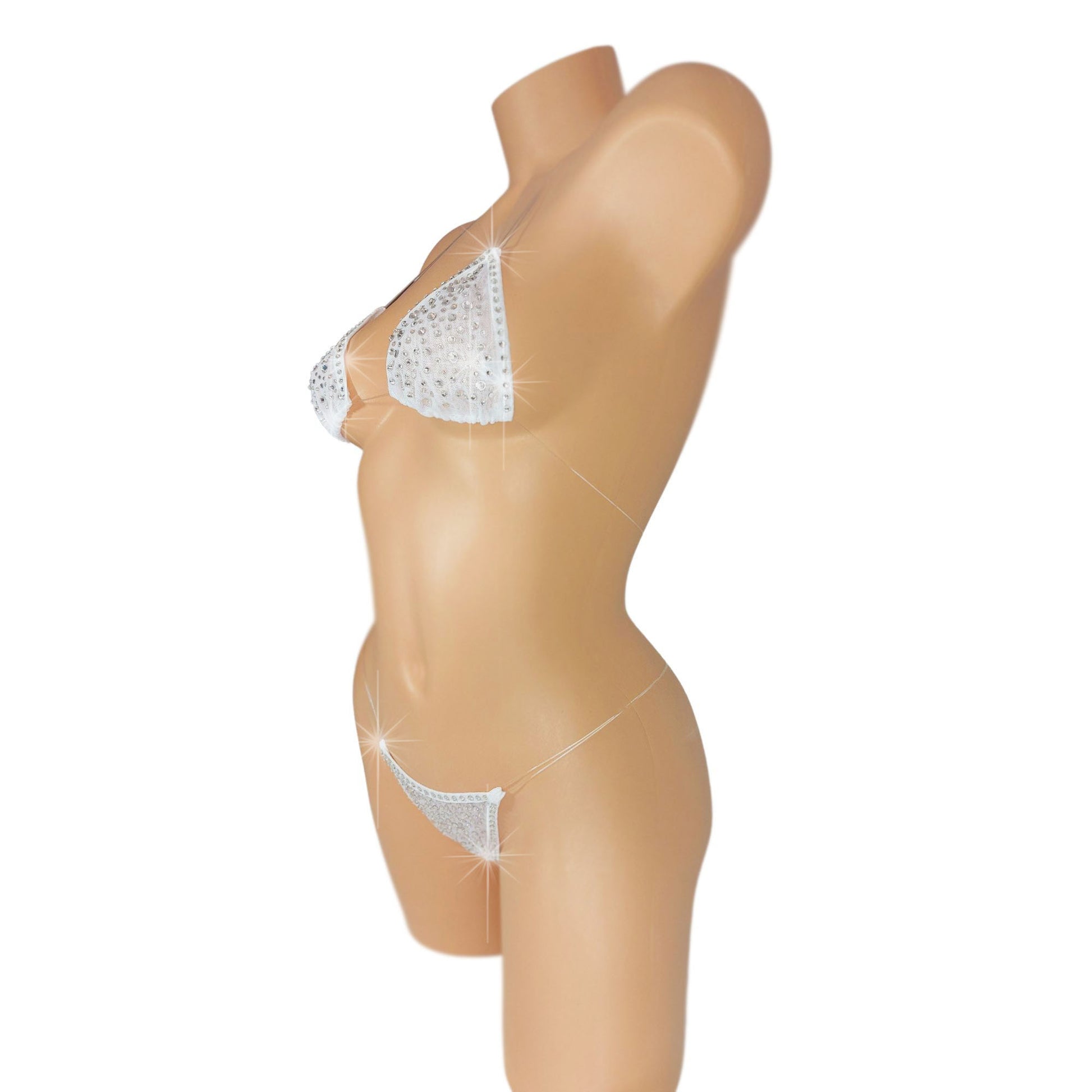 White mesh invisible strap string bikini covered in diamond rhinestones on a curvy mannequin.