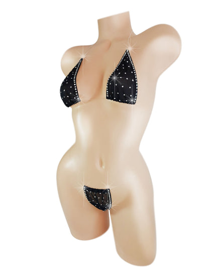 Black mesh halter top and g-string covered in crystal rhinestones on a sexy mannequin.