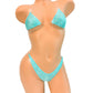 Rhinestone covered Mint colored bikini with clear string ties on a mannequin.