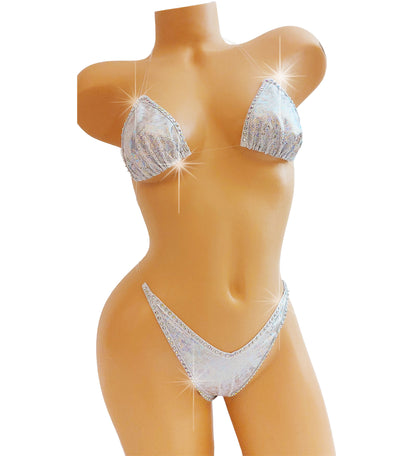 Mannequin wearing white hologram sexy bikini.