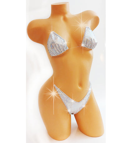 Mannequin wearing white hologram sexy bikini.