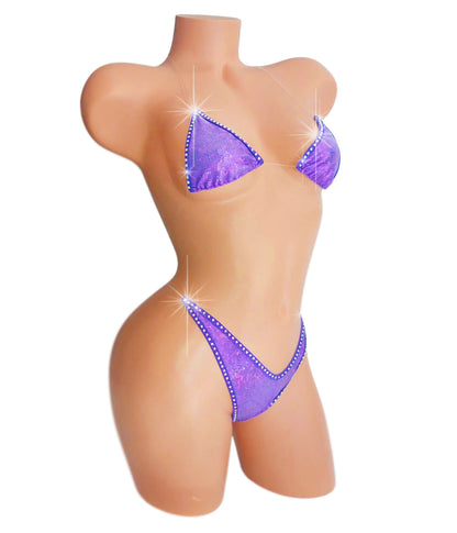 Rhinestone purple hologram clear elastic g-string bikini on a curvy mannequin.
