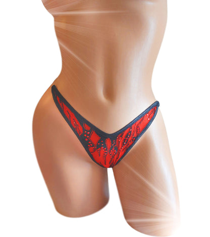 Red mesh lingerie thong with black and red glitter accents and red rhinestones on a sexy mannequin.