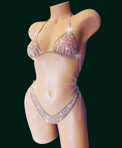 Nude sparkle mesh bikini covered in rhinestones on a curvy mannequin.