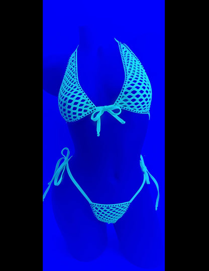 Black light glow shot of Electric green fishnet halter tie bikini with rhinestone outline on a curvy sexy female mannequin.