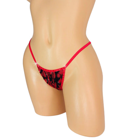 Red flame fabric bikini bottom on a curvy mannequin.