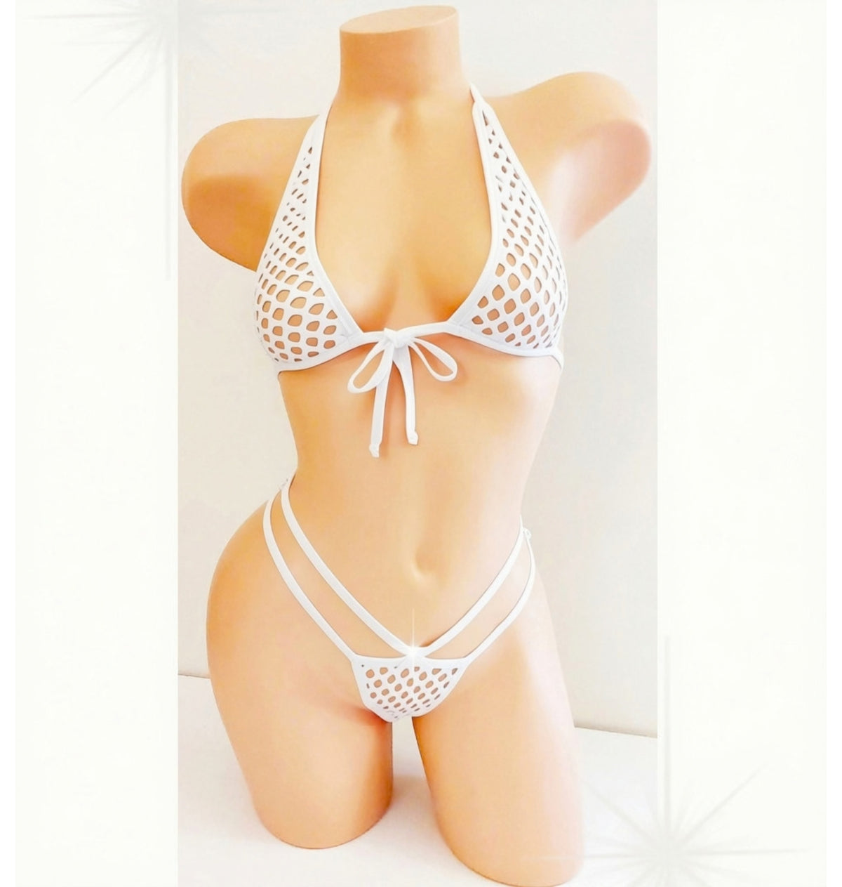 White fishnet bikini set displayed on a beige mannequin torso against a white background.