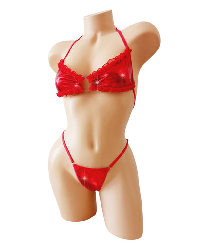 Sexy metallic red red mesh ruffled two piece g-string thong bikini on a curvy mannequin, on a white background.