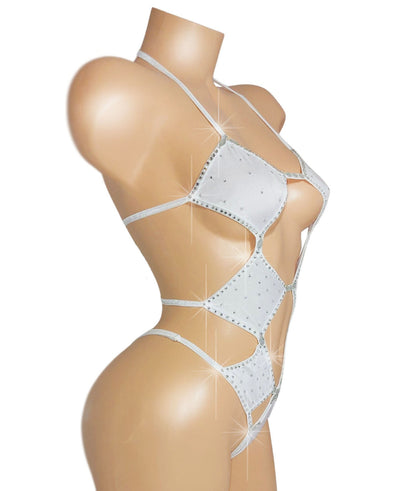 Strappy white one piece with cut outs and covered in rhinestones.