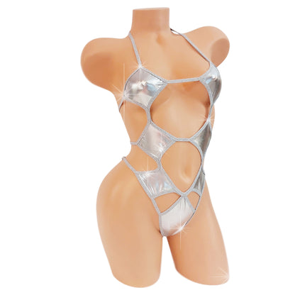 Metallic silver one piece bodysuit with cutouts on a curvy mannequin.