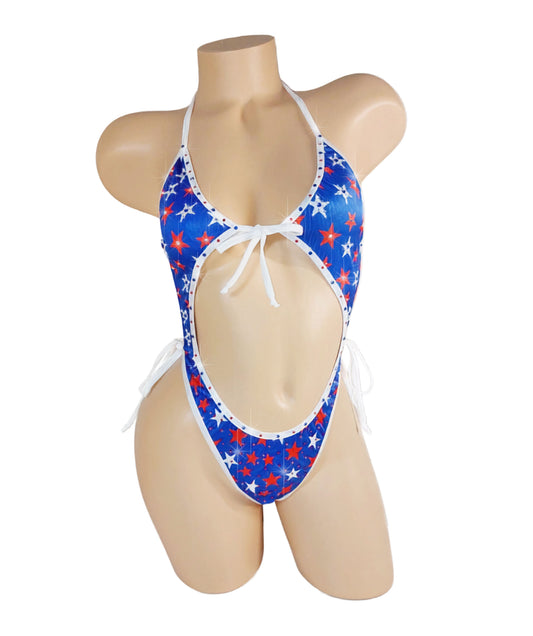 Blue swimsuit with red and white rhinestone star pattern on a mannequin against a white background