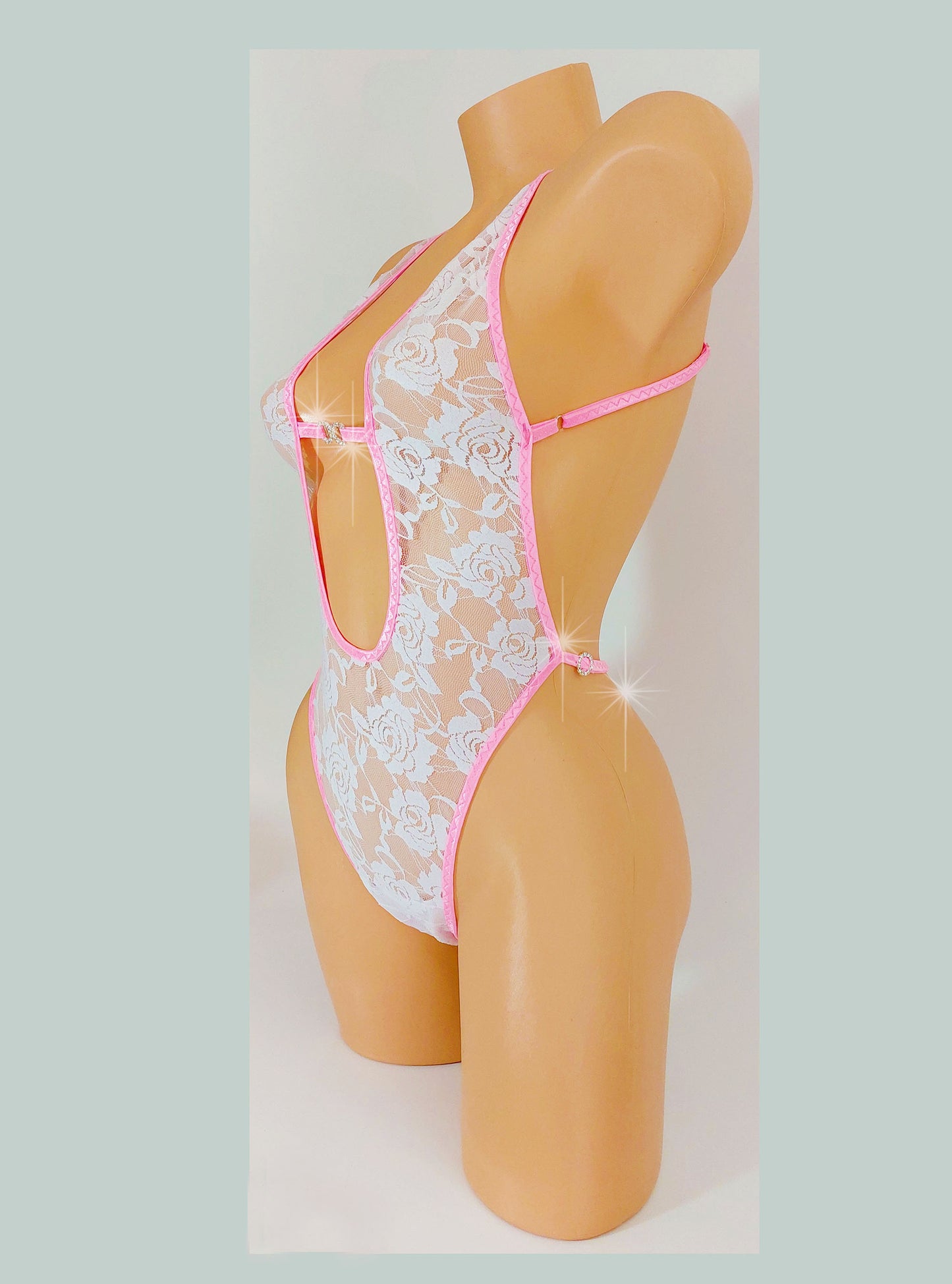 White Lace & Diamond Rings - pink trimmed one piece with adjustable thong. Designs for exotic dancewear, rave, stripper outfits, pole dance lingerie