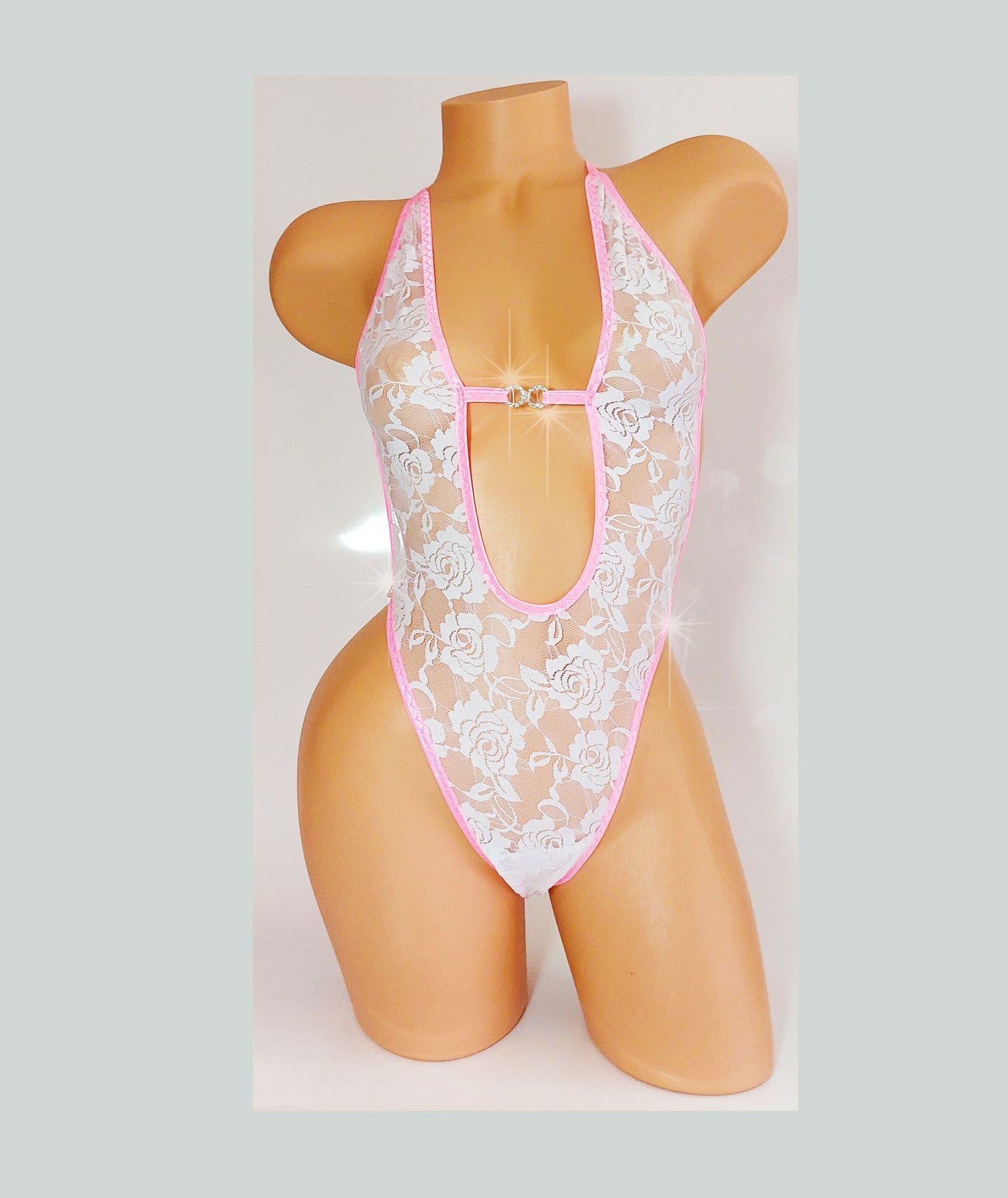 White Lace & Diamond Rings - pink trimmed one piece with adjustable thong. Designs for exotic dancewear, rave, stripper outfits, pole dance lingerie