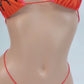 Video of Sexy Orange Halloween bikini with black rhinestone spiderweb pattern on a curvy mannequin.