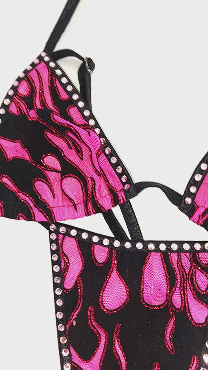Video of Thong bikini with pink rhinestones both product and shown worn on a sexy mannequin.