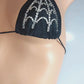 Video of Halloween bikini with rhinestones in a spiderweb design.