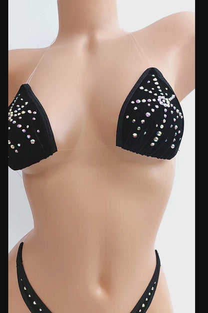 Video of Sexy black clear elastic bikini on a curvy mannequin.
