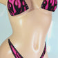 video of Hot Pink flames bikini with rose rhinestone outline all around, with clear illusion clear elastic tie straps.