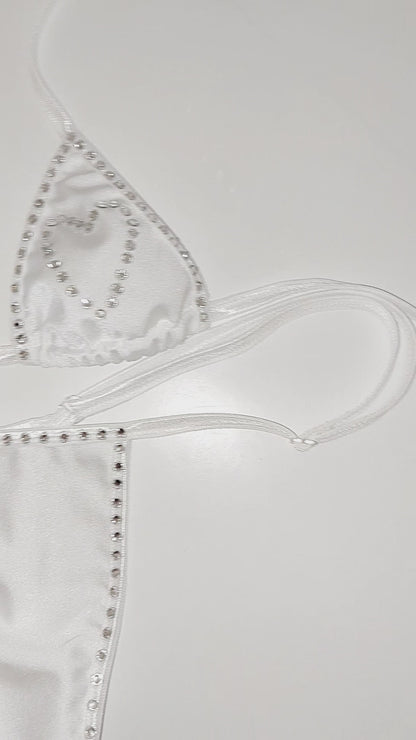 Video of Rhinestone heart white bikini set on a sexy mannequin.
