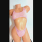 Video of a Baby Pink mesh one piece bodysuit with large center cutout, covered in rhinestones, pictured on a curvy mannequin.