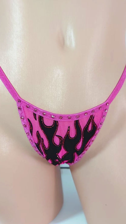 Video of Pink Flame thong bikini with adjustable waistband on a curvy mannequin.