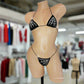 bikini with rhinestones in a spiderweb design with a pumpkin.