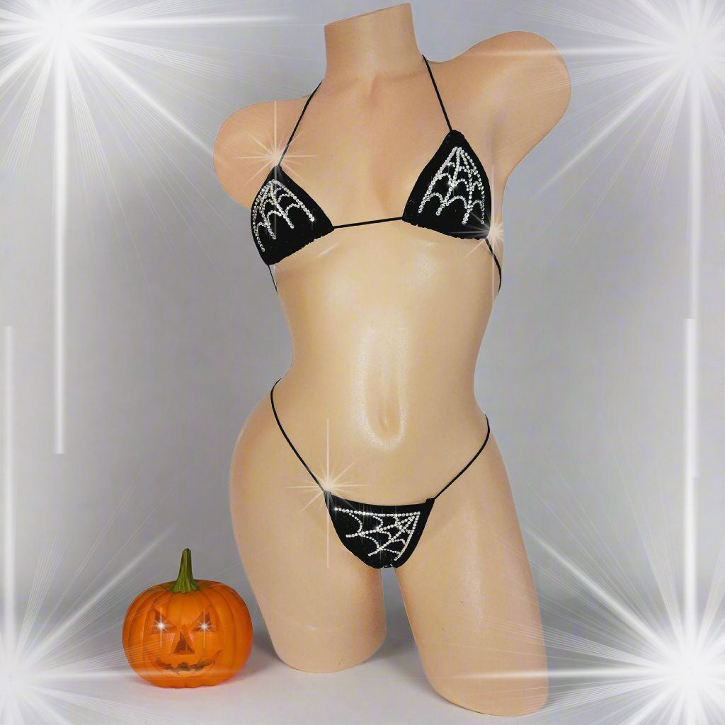 Halloween bikini with rhinestones in a spiderweb design with a pumpkin.