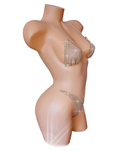 Nude mesh bikini covered in crystal rhinestones on a curvy mannequin.